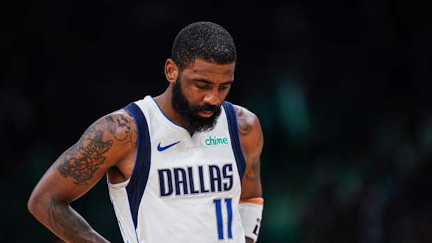 Mar 1, 2024; Boston, Massachusetts, USA; Dallas Mavericks guard Kyrie Irving (11) on the court against the Boston Celtics in the second half at TD Garden.